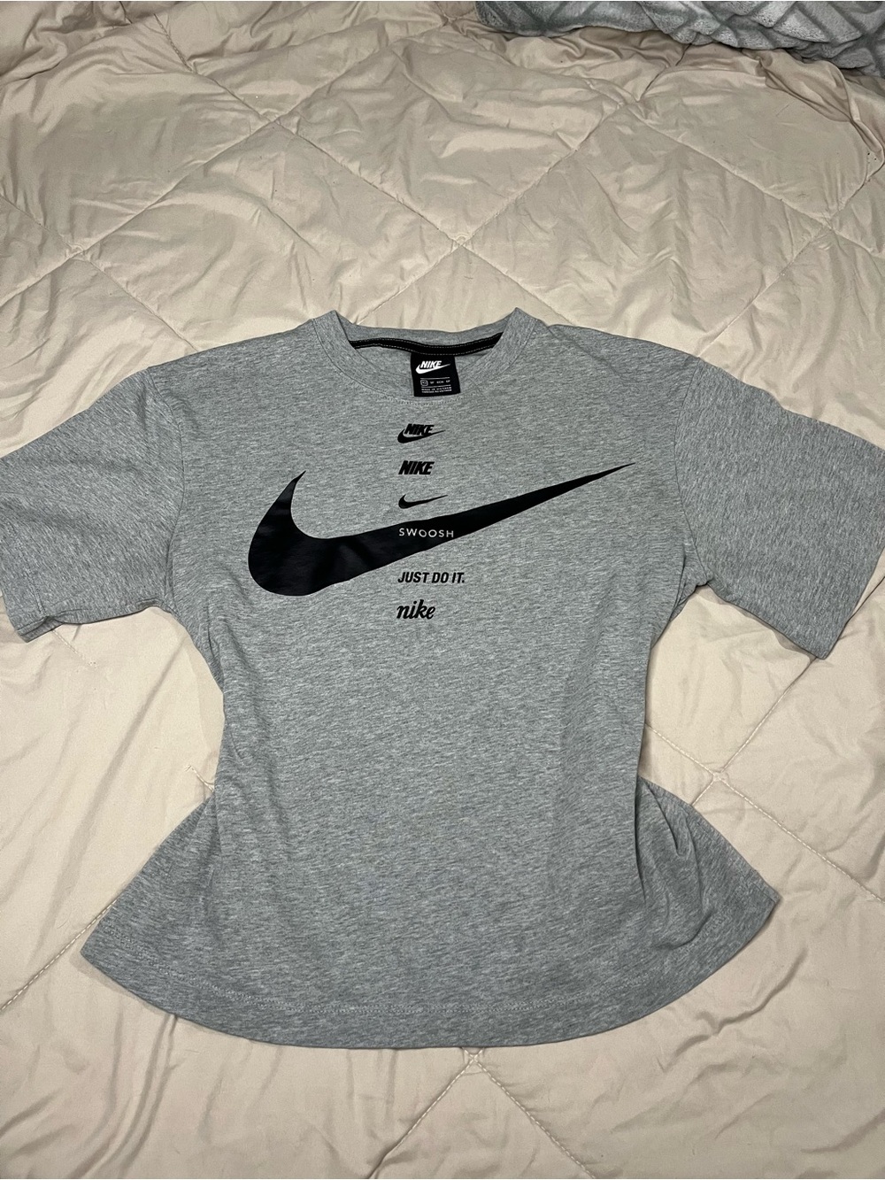 Nike Gray Short-Sleeve Tee with Black Swoosh Graphic